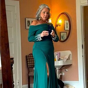 Green evening dress, simple and flattering. Loved wearing it once.